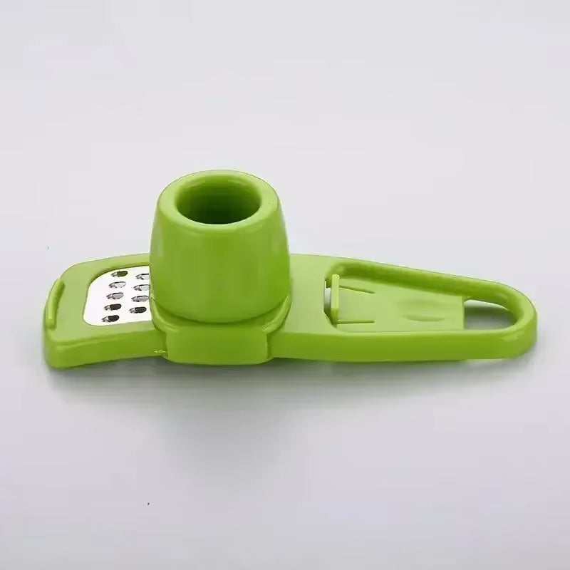 Garlic press disassembled for cleaning