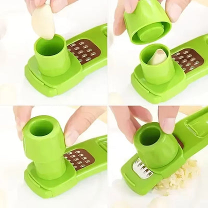 Garlic press being used