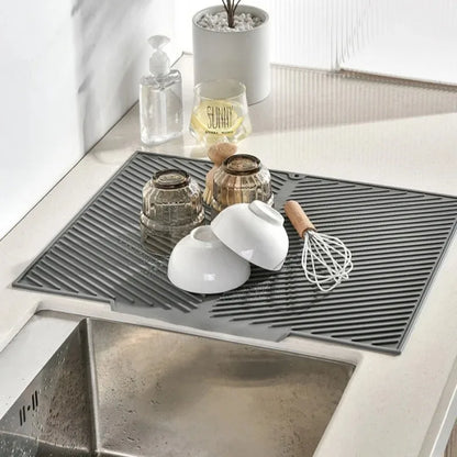 Draining mat with dishes drying