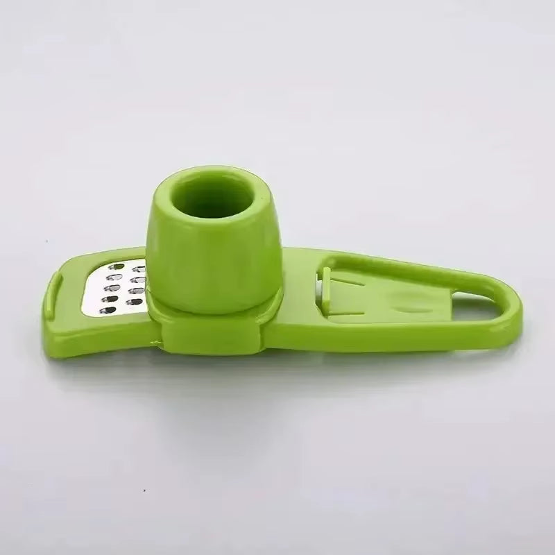 Mini manual garlic press