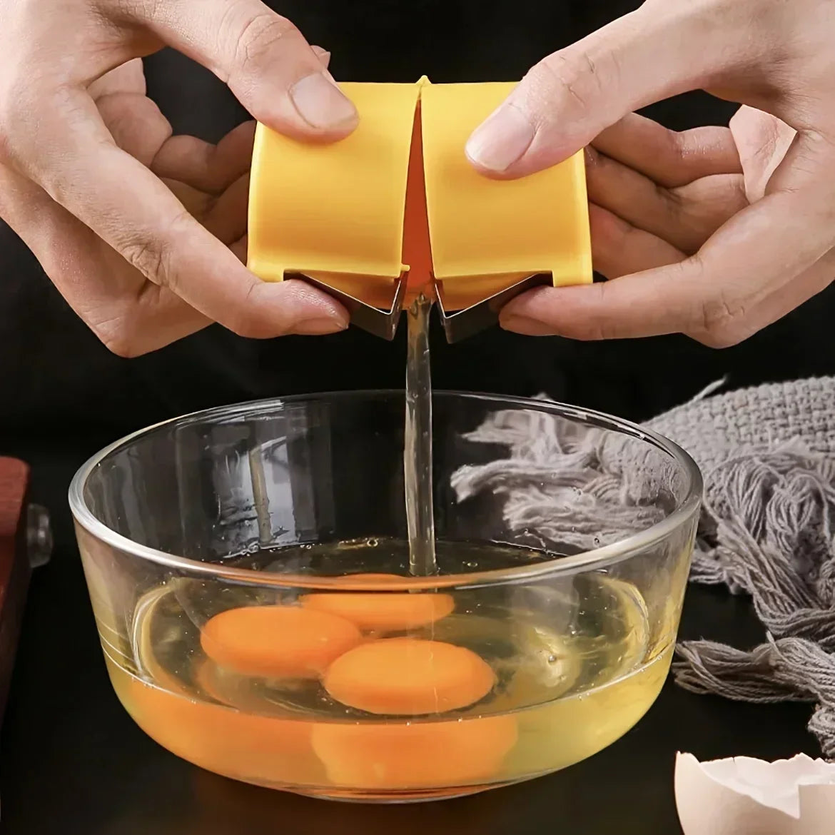 Egg shell opener cracking an egg